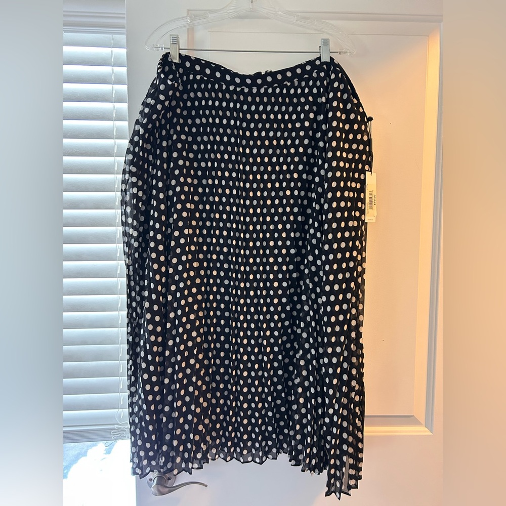 Calvin Klein polka dot, pleated skirt.